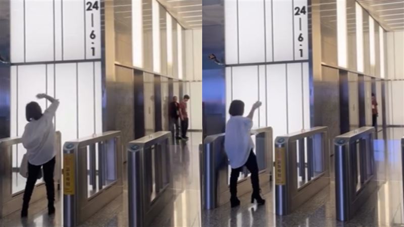 台灣新聞通訊社-信義區大樓驚見女子狂丟雞蛋！失控怒斥「快讓開」　上班族全嚇傻