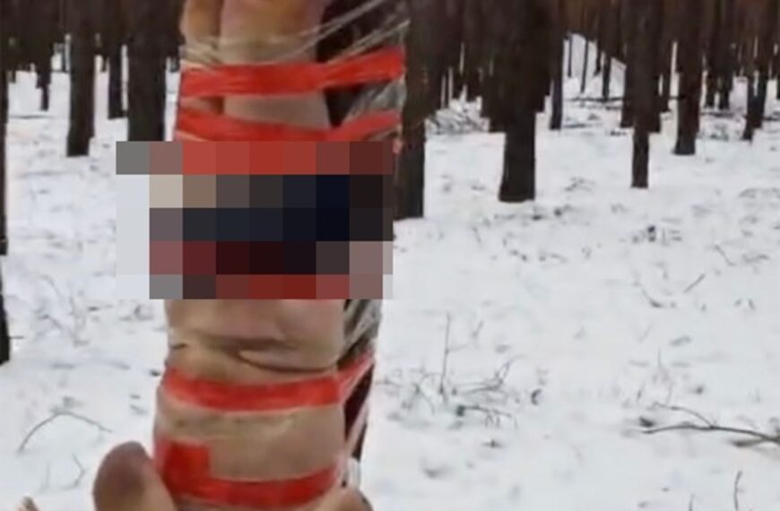 台灣新聞通訊社-俄兵穿「隱形斗篷」扮企鵝慘遭轟飛　內部殘忍虐兵倒吊畫面曝光