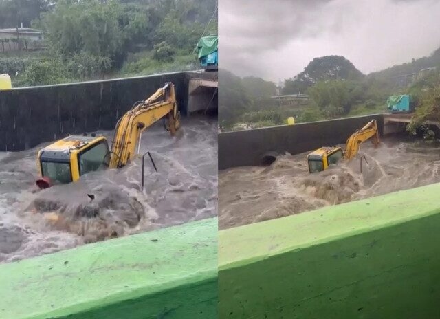 台灣新聞通訊社-午後暴雨強襲！挖土機受困排水溝　洪水瞬間灌入慘遭吞沒