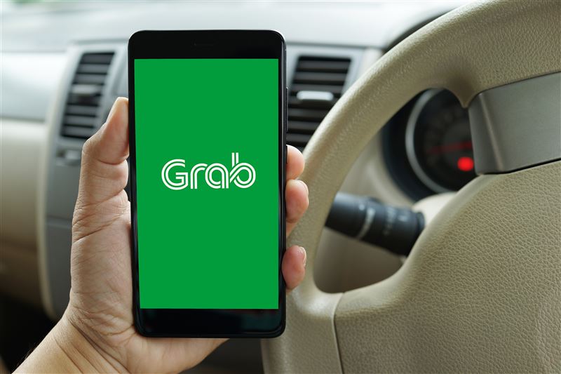 台灣新聞通訊社-Grab收購熊貓卡關?祭「3+3承諾」布局台灣 外送員24小時內無痛轉移