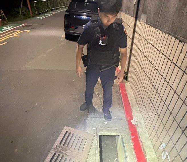 台灣新聞通訊社-美籍女逛夜市遺失手機 大安警「聽音辨位」撬開水溝蓋神救援